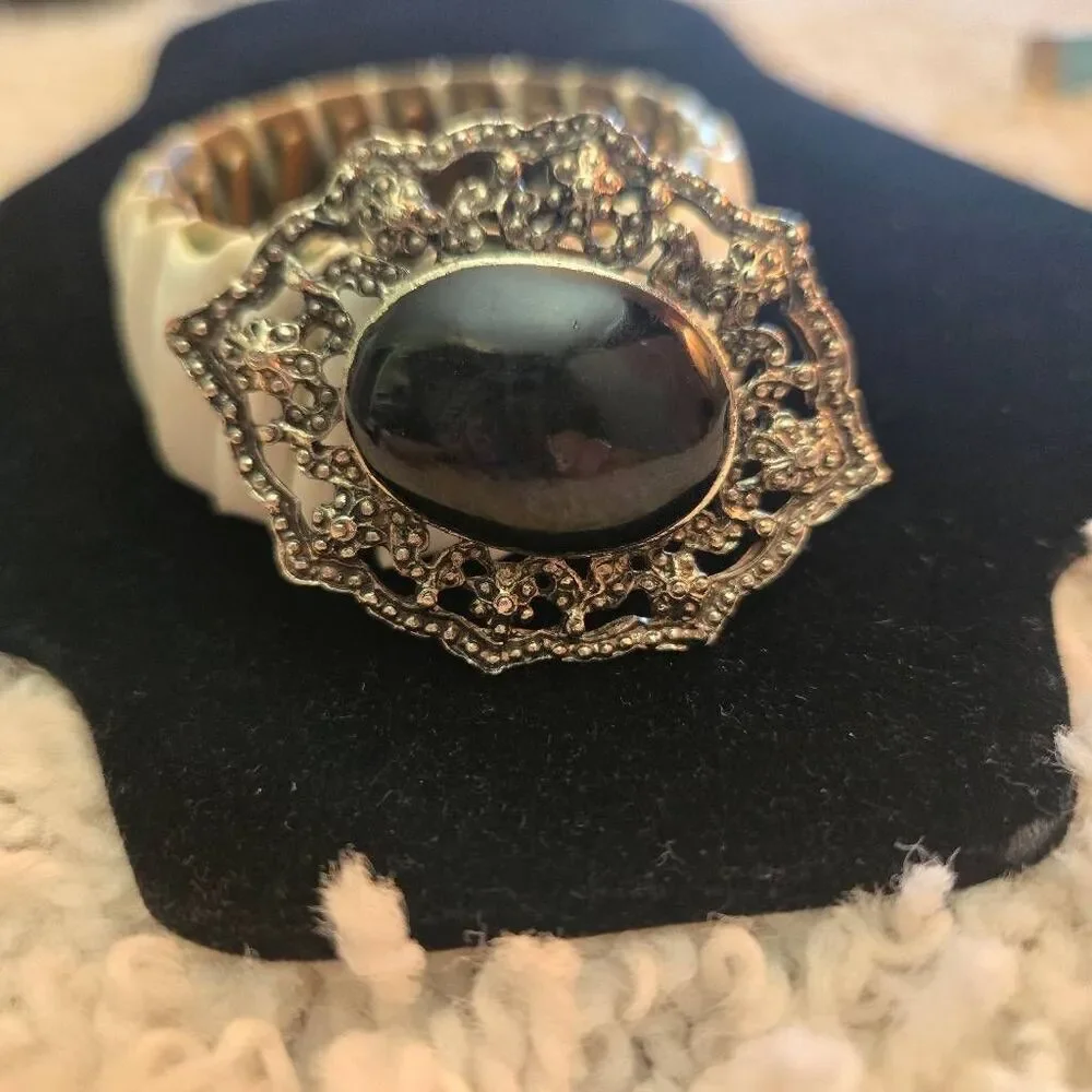 Ornate Silver Black Oval Stone Brooch Pin